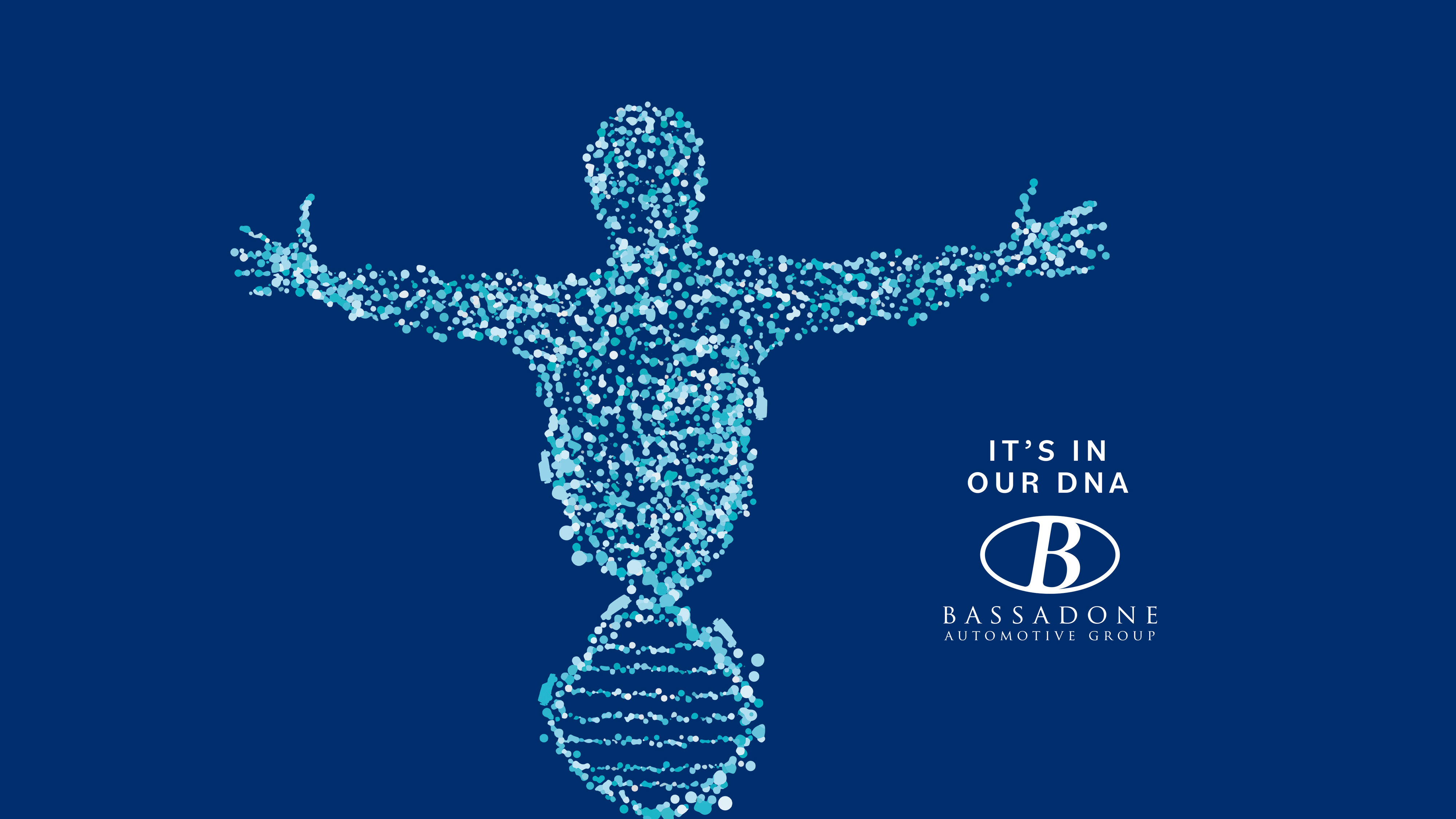 DNA strand in the shape of a person with It's in our DNA written and the Bassadone Automotive Group Logo next to it