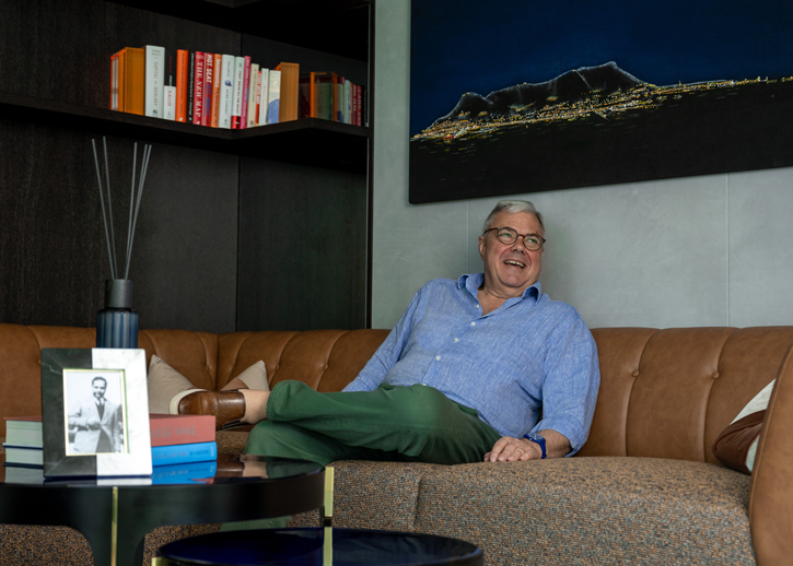 George Bassadone sitting on a sofa talking about Bassadone Automotive Groups values