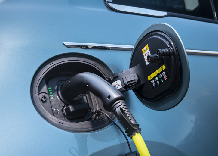 A charging cable plugged in a car